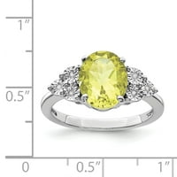 Prsten od čistog srebra s dijamantom i limunovim kvarcom. Karatna težina je 0,03 karata. Težina dragulja - 2,4